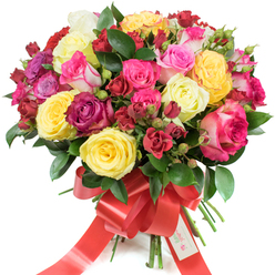 This exuberant, richly coloured rose bouquet is arranged with a florist's eye for rhythm and abundance, displayed against a pure white studio background so every hue and texture reads clearly. Large hybrid tea roses open like miniature suns in bright yellow and creamy ivory, while clusters of smaller spray roses and tight buds in shades from blush pink through vivid fuchsia to deep cherry red create a layered, tactile composition. Interwoven glossy green foliage-probably salal or ruscus-gives a cool, structured backdrop that accentuates the warm petal tones and adds a woodland freshness reminiscent of nearby Epping Forest paths. The stems are gathered tightly and finished with a wide red satin ribbon tied into a bold, elegant bow whose long tails cascade down; the ribbon's sheen reflects the studio light, lending a festive sparkle. Nestled at the knot is a neat white gift tag bearing a simple logo and the words "Happy Holidays," a small, heartfelt message that personalises the arrangement. The contrast of full blooms, clustered sprays and crisp buds produces a rich tactile story: the satiny petals, the tiny bead-like centers of the sprays, the smoothness of the glossy leaves. Imagine the subtle, clean scent of roses with a faint citrus lift as you breathe in-an uplifting fragrance that suits anniversaries, Valentine's gestures, Mother's Day or a warm holiday greeting. Prepared with regional care and available for local delivery across Epping High Street and surrounding villages, this bouquet feels both opulent and lovingly familiar.