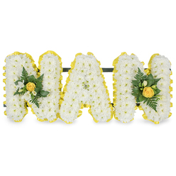 This lyrical tribute honours a cherished grandmother with a gentle, comforting presence-three capital letters spelling "MAM," each densely formed from small white chrysanthemum sprays that ripple like soft clouds. The chrysanthemums' clean whiteness creates a secure, tender backdrop, while mellow yellow roses at each end are left slightly furled so their scent and warmth feel intimately reserved rather than bold. Interlaced among these focal roses are delicate white freesia or similar small white buds whose subtle perfume lifts the arrangement with a fresh, green-mineral note; tiny bright green leaves and sprigs of fern add texture, movement and the reassuring suggestion of new growth. Every letter is edged with a bright, pleated yellow ribbon that crisply defines the silhouette and provides a sunlit outline against the cool white of the chrysanthemums. A narrow dark support bar behind the upper sections makes the piece stable for display at a funeral chapel, graveside, or on an easel in a family lounge. Visual balance and meticulous wiring reveal the hand of a florist who understands how to combine dignity with warmth-this is a bouquet that invites memory: afternoon tea conversations, a laugh shared under the trees at Epping Forest, the quiet comfort of a grandmother's embrace. Presented on a plain white background, the colours read with tender clarity. The arrangement conveys solace and gentle joy, a personal and appropriate floral language for farewell and remembrance that feels both familiar and elegant to families across Epping and nearby villages.