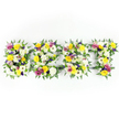 A head-on photograph of a large, horizontal floral tribute spelling the word BEST in four bold, capital letters, framed against a clean, bright white background. Each letter is densely built from fresh, tightly packed blooms-sunny yellow roses and gerbera daisies that give the arrangement a warm, uplifting glow; crisp white, multi-petaled chrysanthemum-like blooms that add fullness and a soft, cushiony texture; and clusters of gentle lavender to deep purple lisianthus or small chrysanthemums that introduce a quiet, dignified depth. Scattered amongst the larger flowers are sprays of vivid magenta-pink spray roses or carnations and tiny pale green and white filler blossoms that create delicate contrast and layered texture. Dark green fern fronds are woven around each letter's perimeter, their feathery blades softening edges and lending a natural border caught against the bright backdrop. In a few narrow gaps the dark green or muted-metal support bars peek through, hinting at the sturdy framework that holds the piece together. The lighting is even and bright, bringing out the cool whites, warm yellows, and jewel-toned purples while suggesting a faint, comforting scent of rose and chrysanthemum when imagined up close. The overall mood reads as both celebratory and reverent-perfect for a tribute that remembers someone as the best, whether placed at a funeral near St John's or laid in a communal service beneath the trees of Epping Forest. The workmanship is clearly handcrafted by an experienced florist, with attention to balance, colour harmony, and the tactile interplay of petals and fern.
