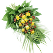 A beautifully composed funeral spray of yellow roses and red berries lies diagonally across a clean white background, its form and colours standing out with quiet clarity. The stems are gathered firmly at the top left, where a fan of broad, dark green leaves is folded and arranged into a structured, almost sculptural base. From this point, the flowers and foliage flow down towards the lower right, creating an elegant, elongated teardrop shape that feels natural yet carefully planned, echoing the style of tributes often delivered for services around Epping's churches and crematorium chapels. Along the centre of the spray, a generous cluster of vivid yellow roses forms the focal line. Some blooms are tight buds, promising fullness, while others are partially or fully open, their petals soft and velvety, layered in gentle spirals that catch the light. Threaded in and around these roses are numerous small, glossy red Hypericum berries, adding rich, jewel-like accents that contrast beautifully with both the golden tones of the petals and the deep greens of the foliage. The greenery itself is varied and abundant: large, smooth leaves provide a dense, verdant backdrop, while from the lower right, several fine, palm-like fronds extend outward in a sweeping curve. Their slender, pointed leaflets introduce a sense of airiness and movement, preventing the design from feeling heavy. The white background allows the yellow, red, and green hues to appear vivid and true. Overall, the spray conveys a feeling of peaceful remembrance and gentle warmth, a fitting floral expression for families in Epping wishing to send a respectful, heartfelt final tribute.