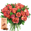 This meticulously arranged Epping gift set brings together the vibrant artistry of fresh flowers and the refined sweetness of gourmet chocolates. The bouquet, taking centre stage, features a dramatic medley of open roses in sunset hues-coral, peach, soft salmon, and rich pink-each petal elegantly shifting from pale cream at its core to deeper, saturated edges, producing a striking bicolor effect. Some blossoms are in full, velvety bloom, while others are caught in a tender moment of unfolding, symbolising promise and celebration. Dark green leafage, expertly worked between the stems, amplifies the warmth of the roses and adds lush structure. Nestled alongside, a light beige Thorntons Orange Crisp chocolate pouch stands forward; its distinctive branding and detailed illustration highlight the indulgent contents-truffles bursting with zesty orange and crispy wafer within glossy milk chocolate shells. Two unwrapped truffles gleam in front, boasting their rich, dark sheen. Illuminated by diffused daylight, this union of fresh bouquet and artisan chocolate captures the spirit of special occasions in Epping-perfect for gifting on anniversaries, birthdays, or cherished moments with loved ones across Theydon Bois or on Lindsey Street. Every detail, from colour to composition, reflects a local florist's thoughtful touch and the joy of giving in our close-knit community.